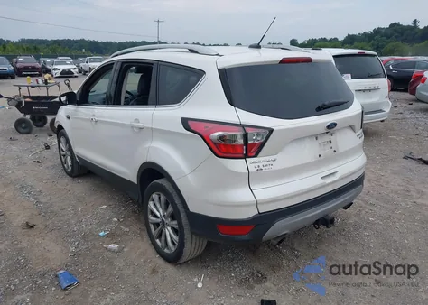 2017 Ford Escape Titanium z USA, uszkodzony, nr VIN 1FMCU9J96HUF09433